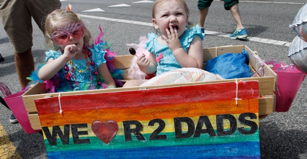 Reuters-children-of-gay-couple-pride-parade-photog-Jonathan-Alcorn
